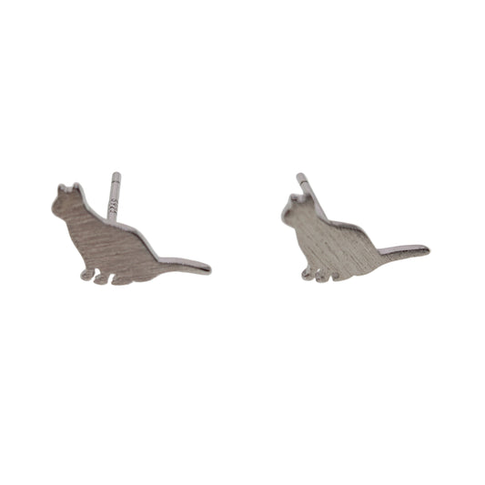 Cat-shaped earrings on a white background