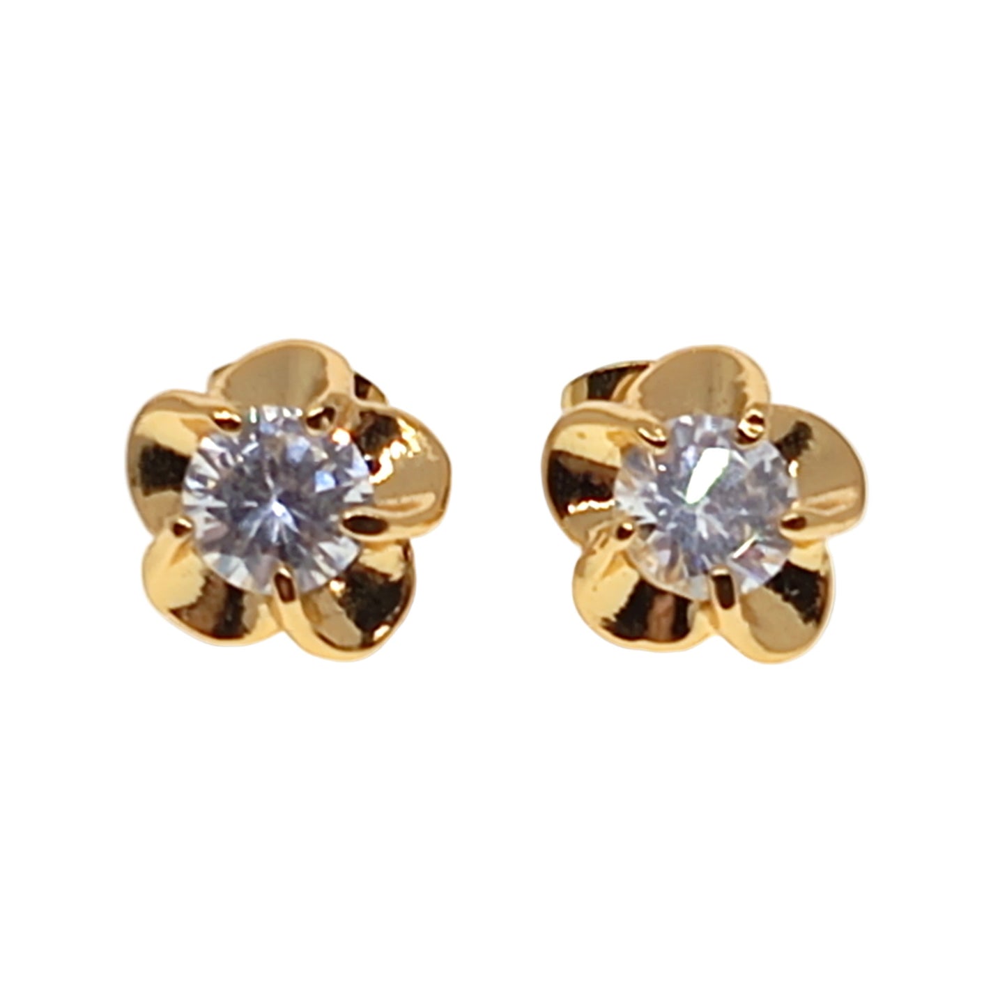 Gold flower-shaped earrings with clear gemstones on a white background