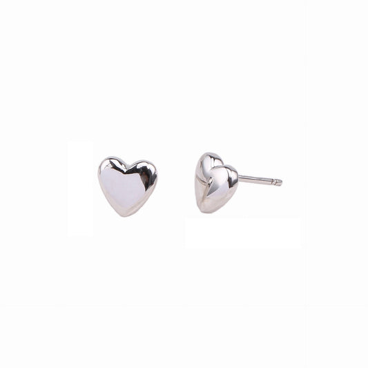 Heart-shaped silver earrings on a white background