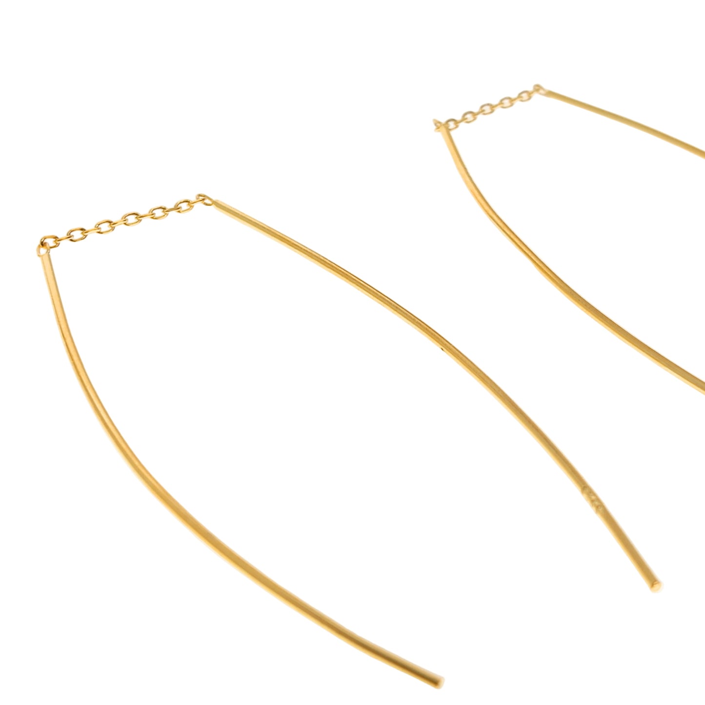 Gold threader earrings on a white background