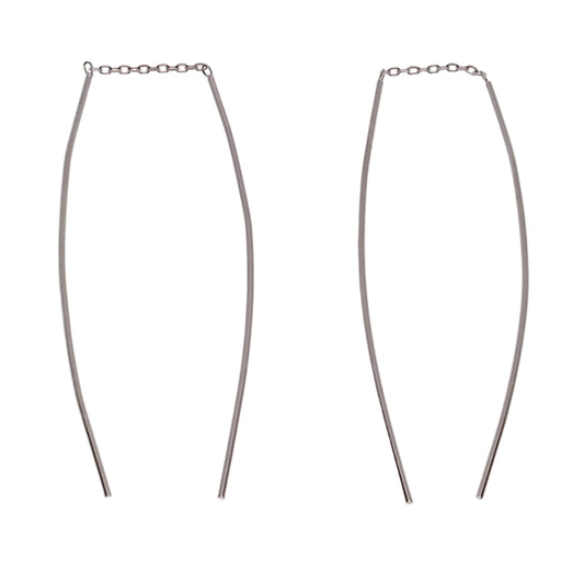 Two thin metal chains on a white background