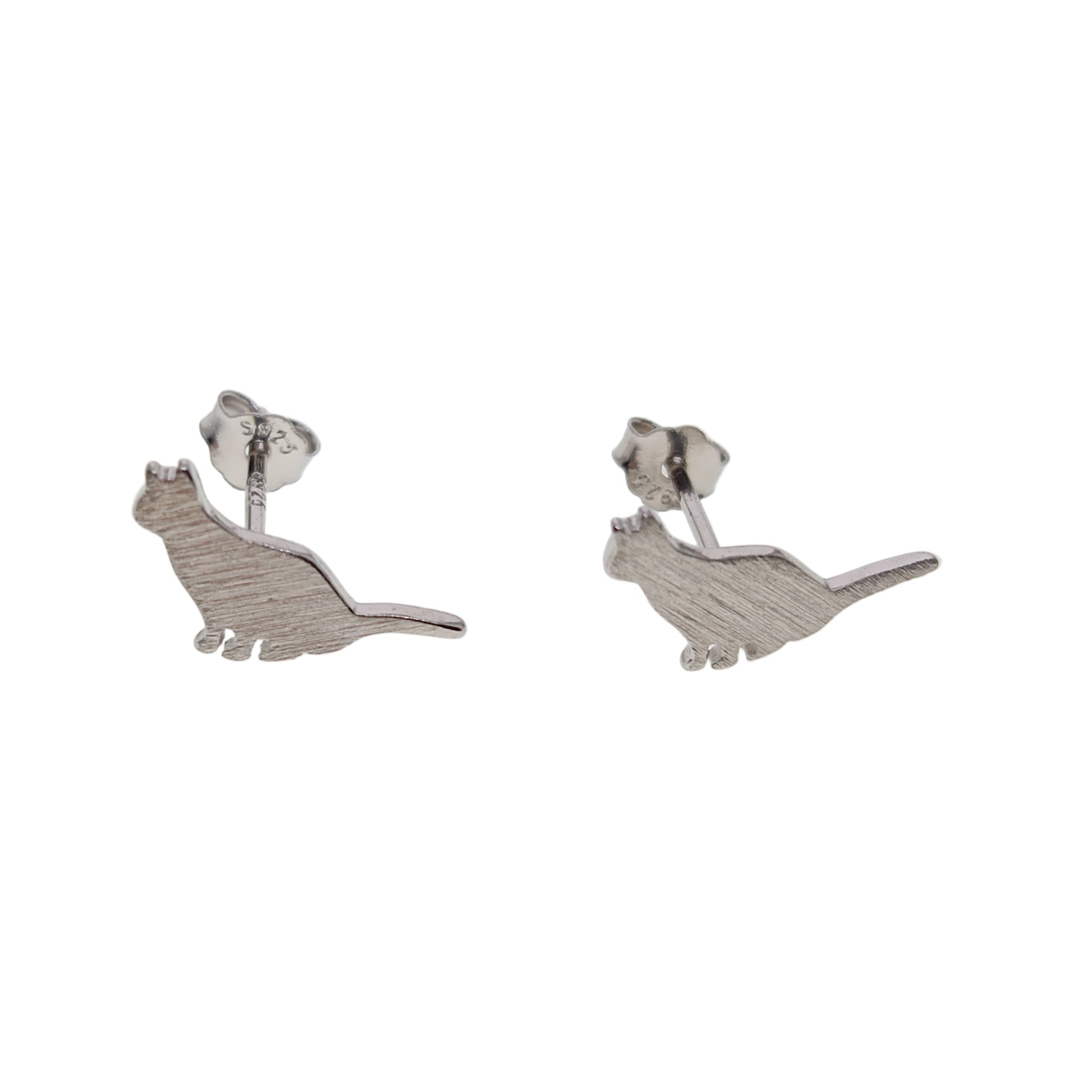 Pair of silver cat-shaped earrings on a white background