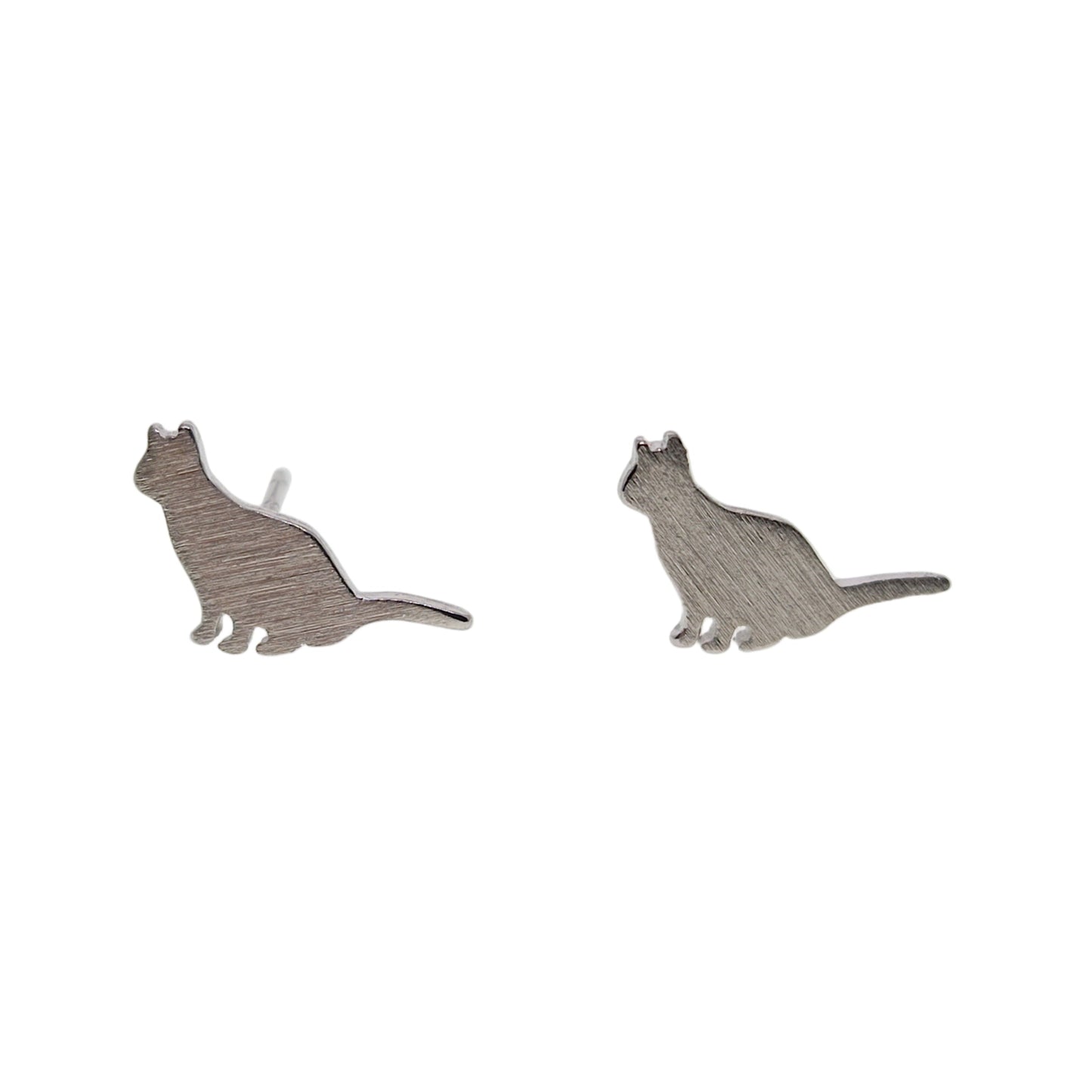 Cat-shaped earrings on a white background