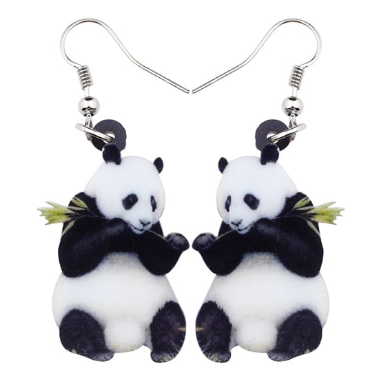 Panda-shaped earrings on a white background