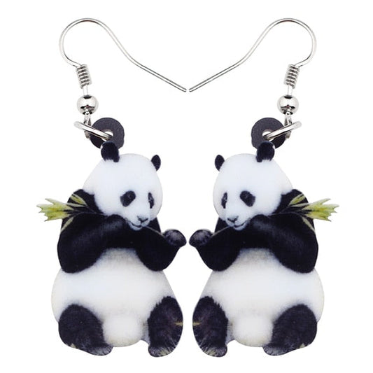 Panda-shaped earrings on a white background