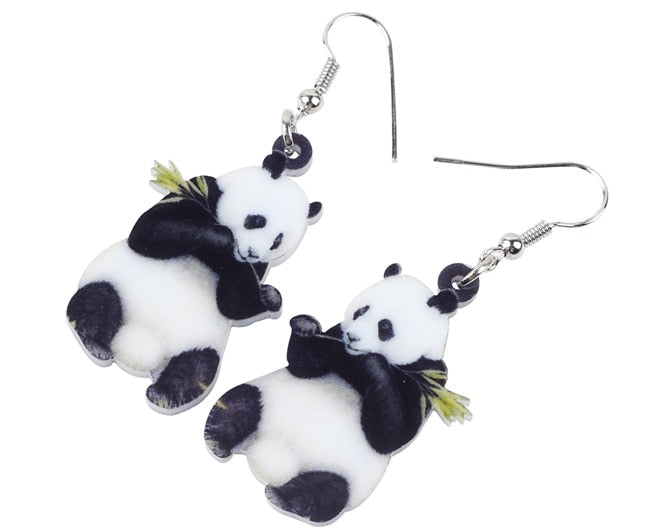 Panda-shaped earrings on a white background