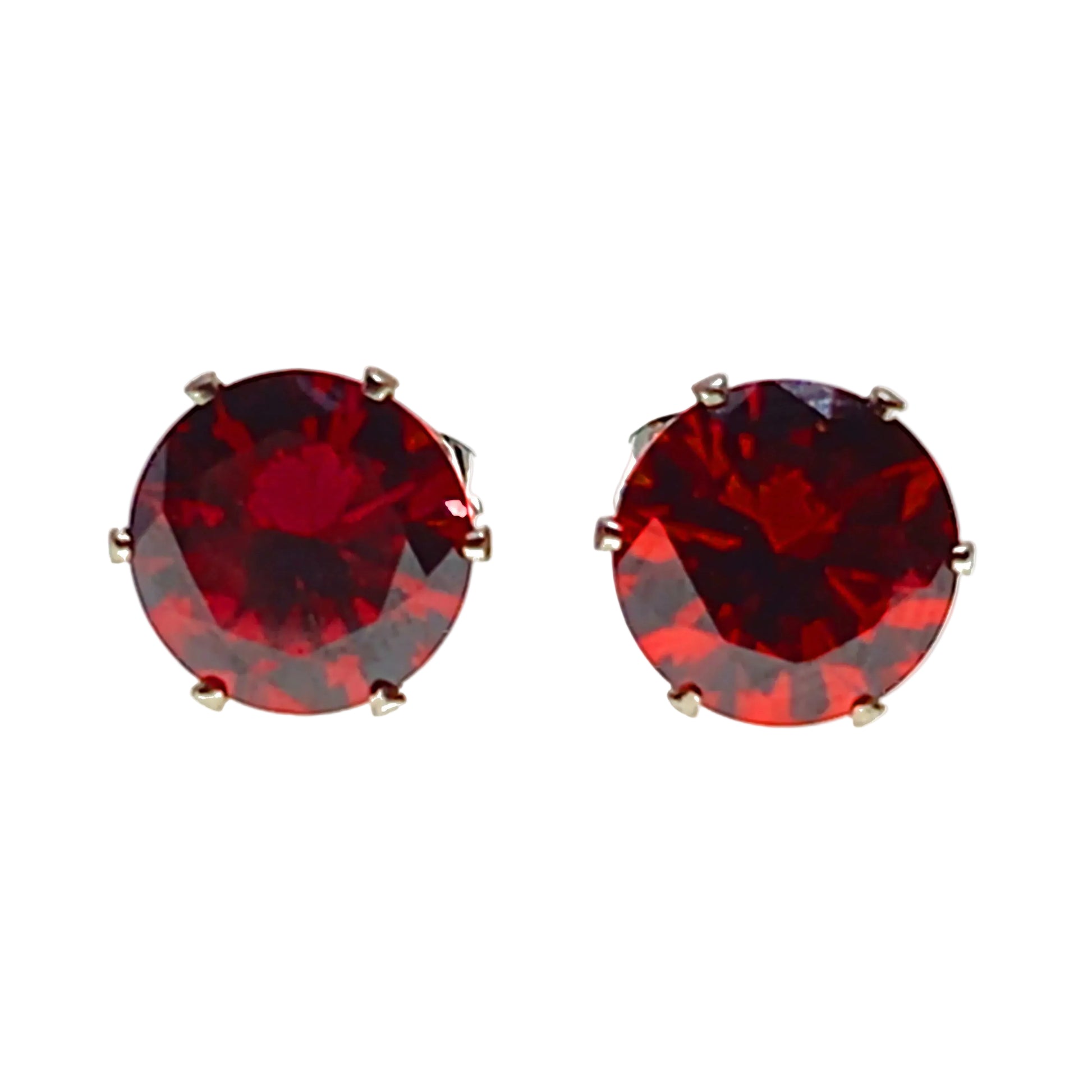 Pair of red gemstone stud earrings on a white background