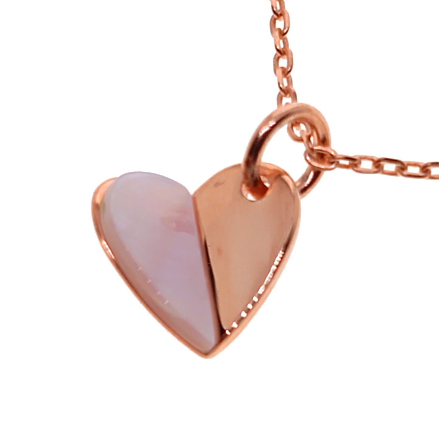 Heart-shaped pendant with rose gold chain on a white background