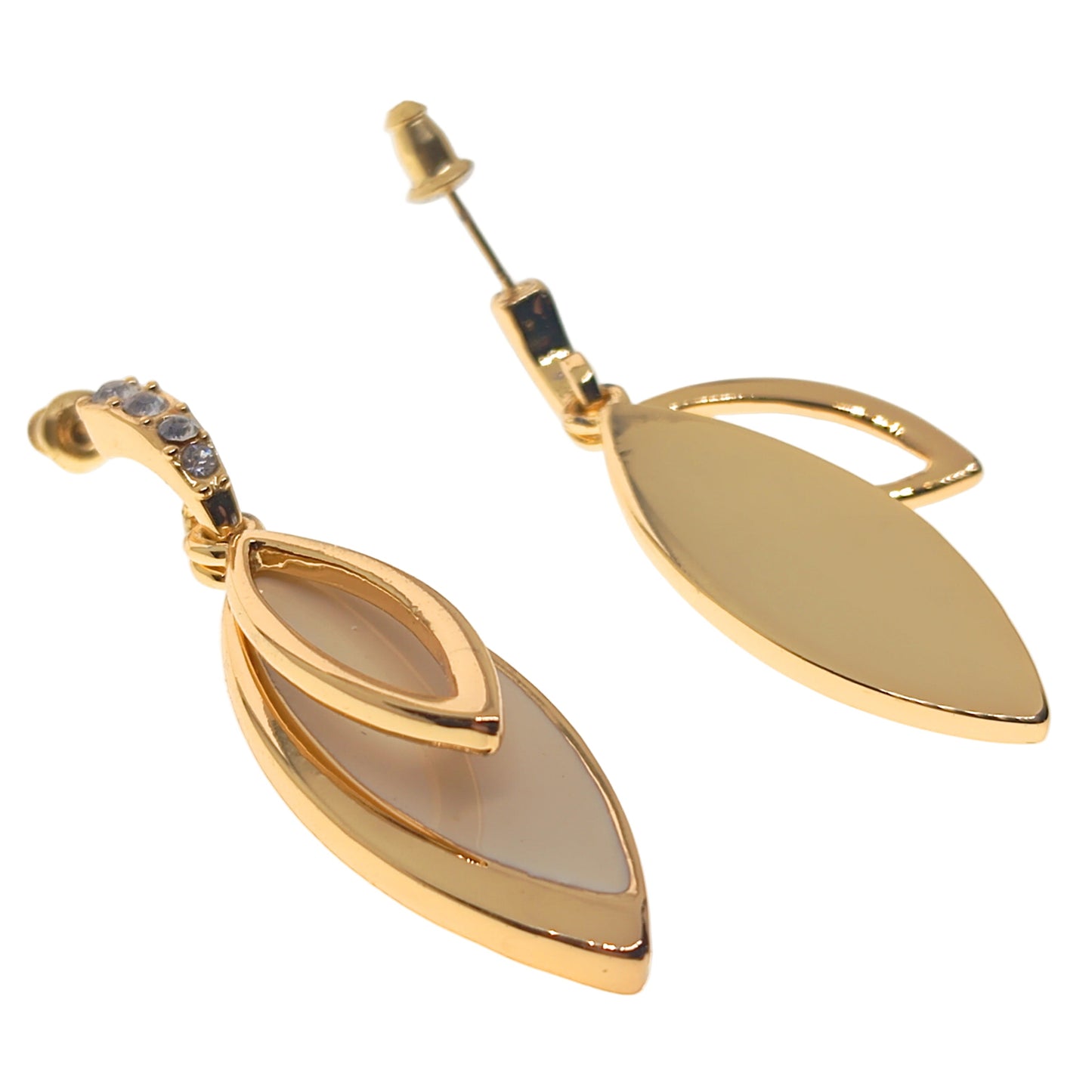 Gold leaf-shaped earrings on a white background