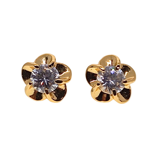 Gold flower-shaped earrings with clear gemstones on a white background