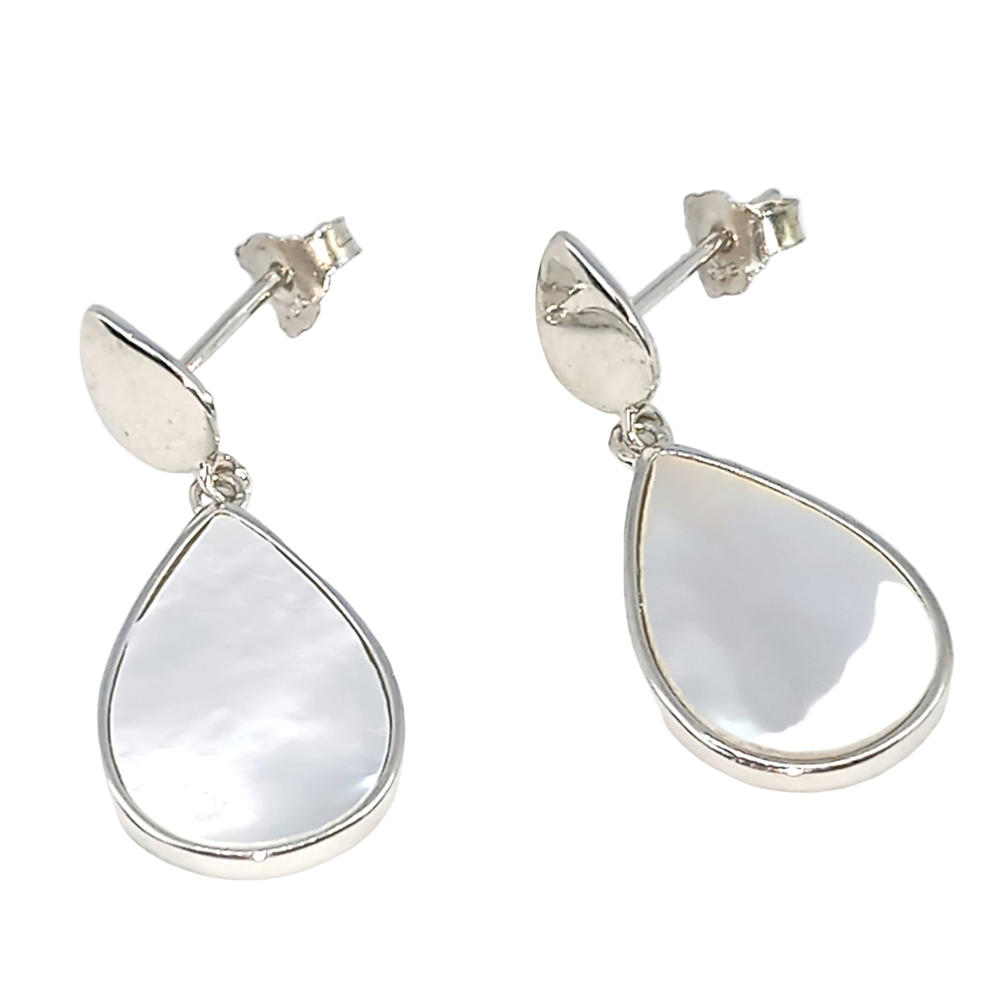 Silver teardrop earrings with a white stone on a white background
