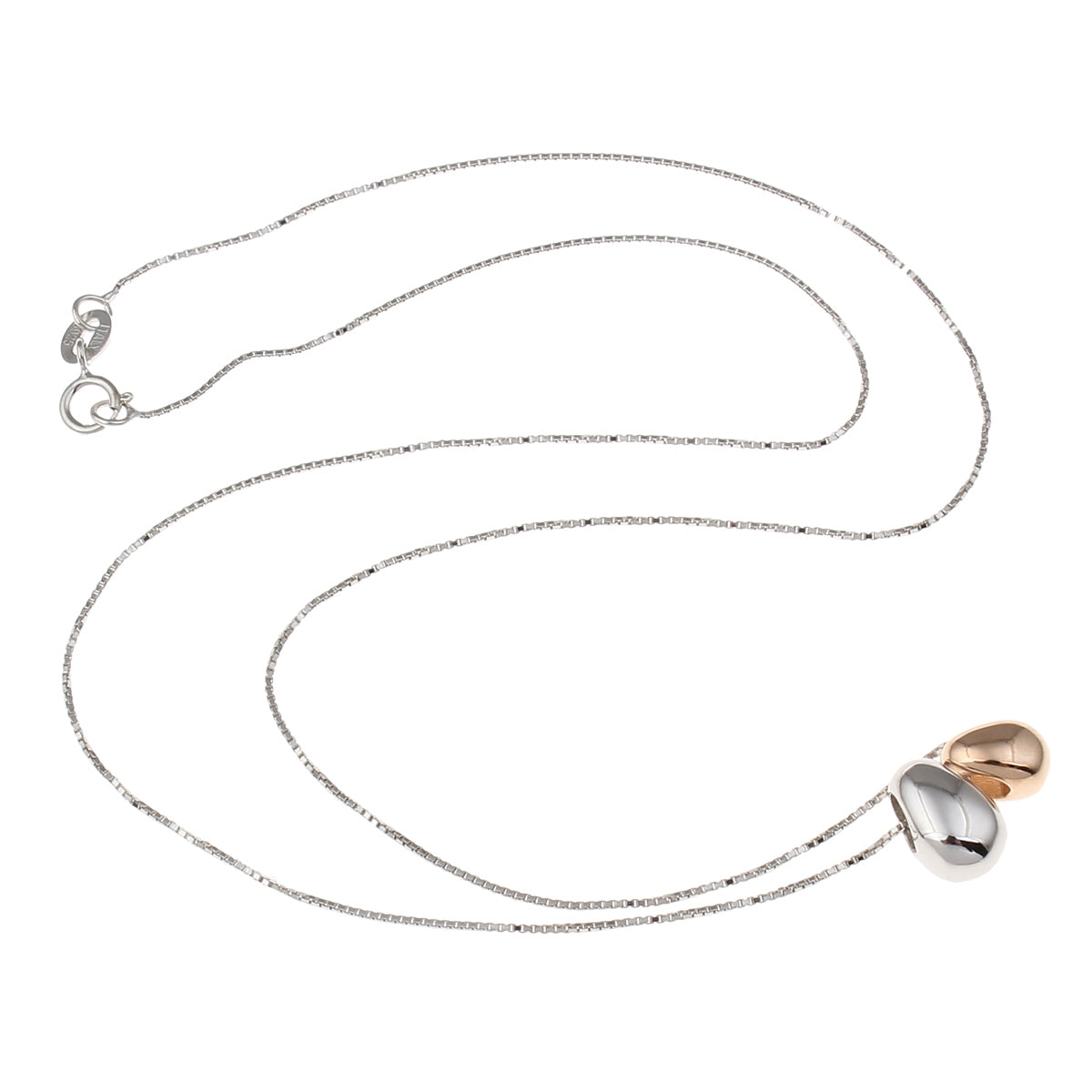 Necklace with three pendant charms on a white background